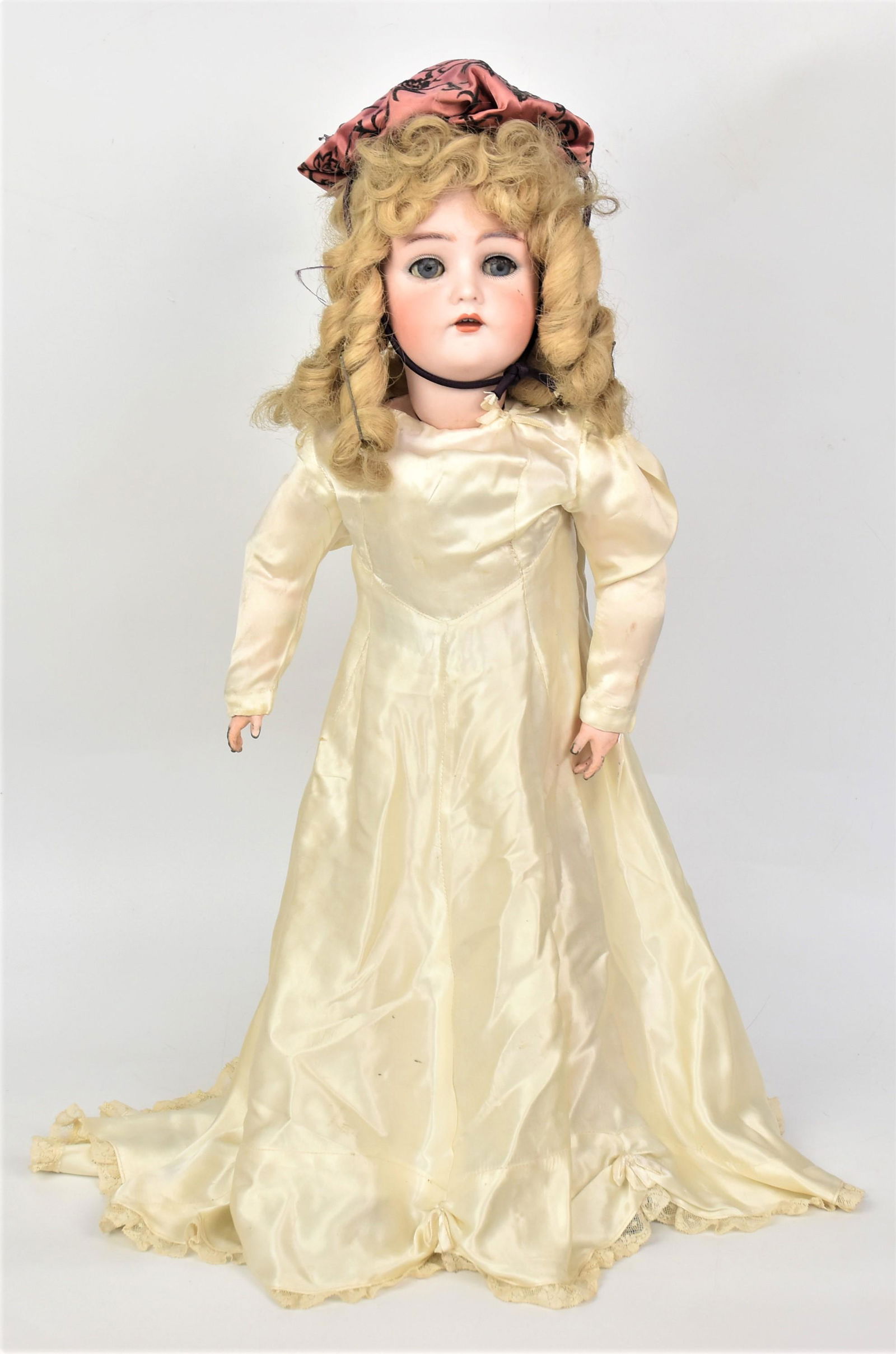 Simon Halbig K star R Bisque Socket Head Doll: Marked as above on back of head with blue glass sleep eyes, open mouth newer blonde wig, old but not period outfit on jointed composition body, 25" tall. Condition as above.