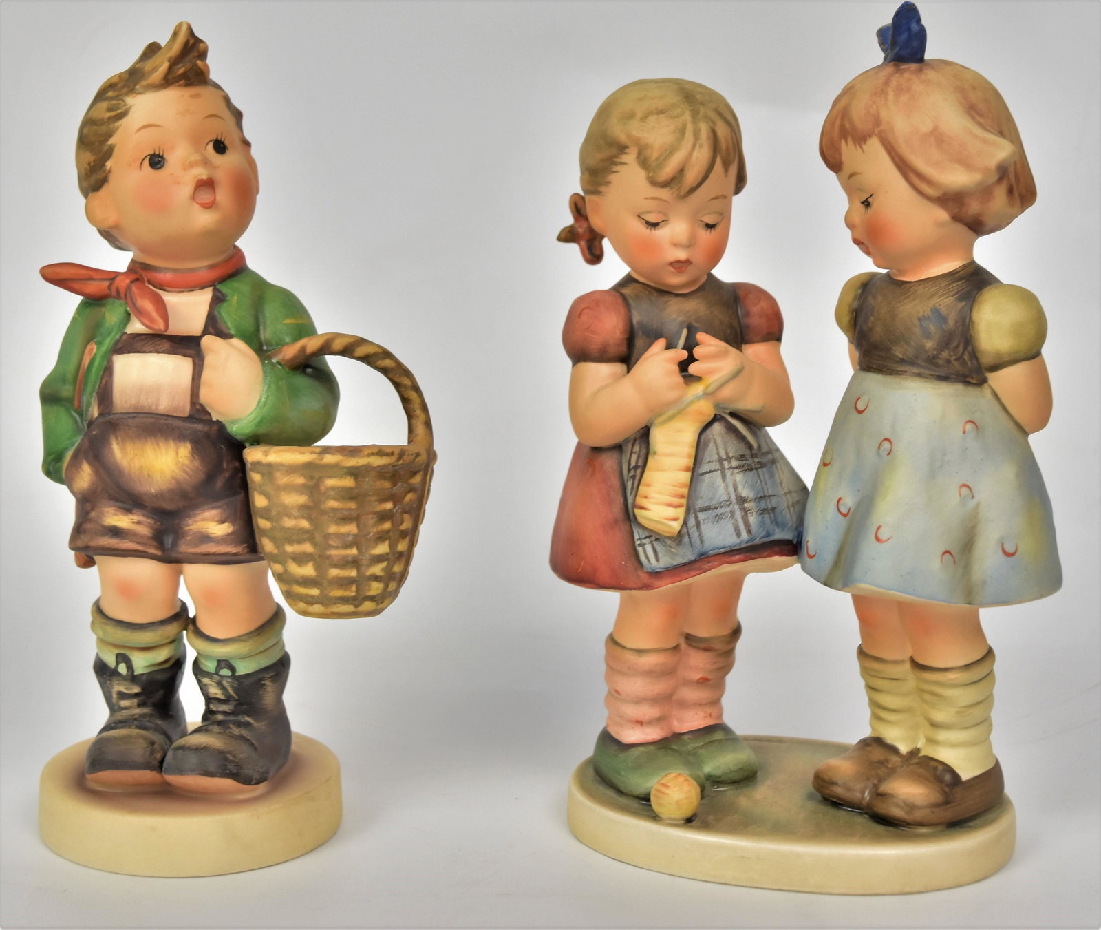 Two Large 8" Hummel Figurines: Includes Knitting Lessons TMK-6, # 51/1 TKM-5, tallest 8". Both in good condition