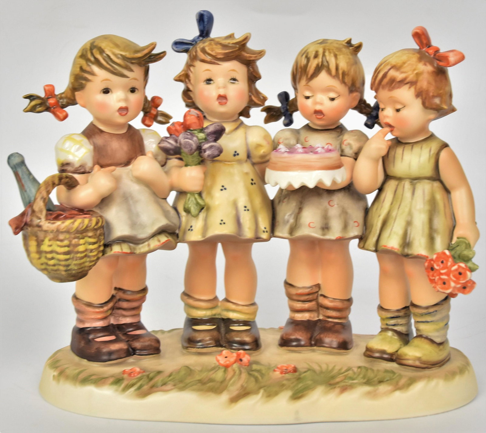 Large We Wish You The Best Hummel Figurine: #600 - TMK-7 , also century collection 1991, measures 8"' H . Good condition.