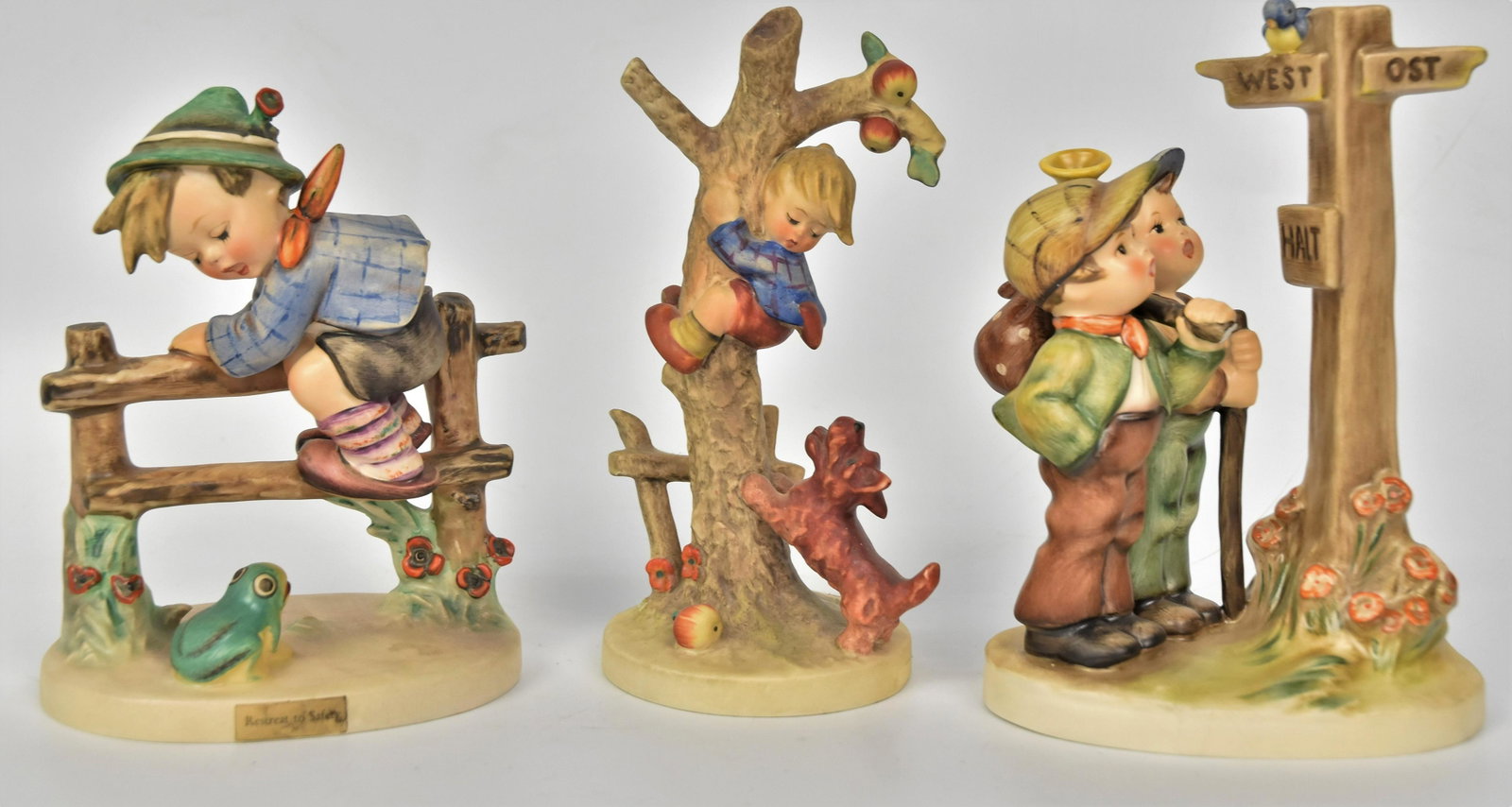 Three Hummel Figurines: Tallest 7" including #331 TMK-7 small repair to hobo sack, #56/A TMK-3, #207/I TMK-4