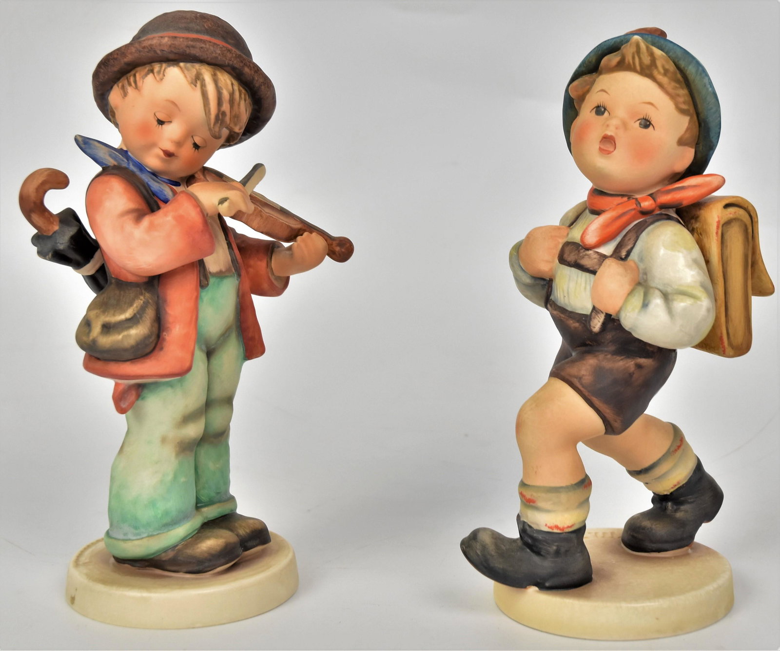 2 Large 8" Hummel Figurines: Includes #82/II TMK-6, 2/I TMK-6. Both in good condition.