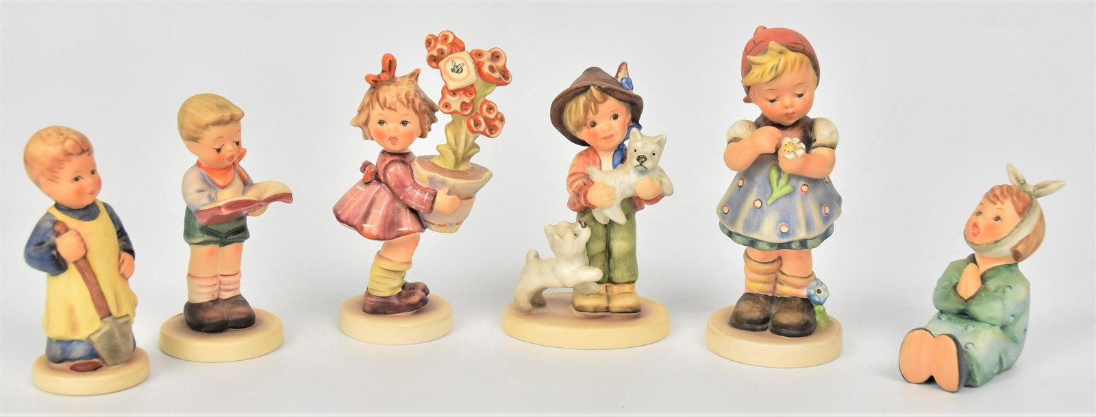 Six Hummel Figurines: Including #380 TMK-6, #2008 TMK-7, #570 TMK-7, #533 TMK-7, #2087/B TMK-8, #727 TMK-7, TALLEST IS 5"H . All good condition.