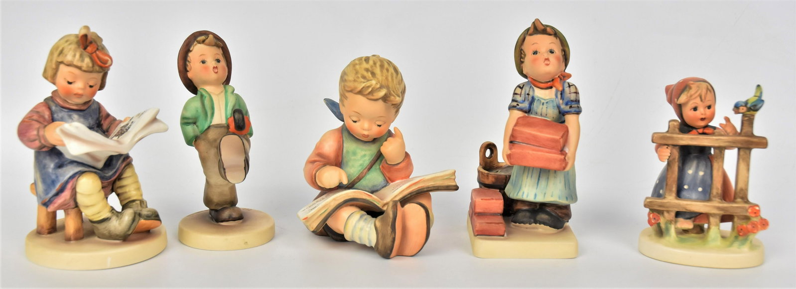 Five Hummel Figurines: Includes #305 TMK-5, #203 2/0 TMK-3, #109 TMK-5, #418 TMK-7, #415 TMK-7 tallest is 5". All good condition.