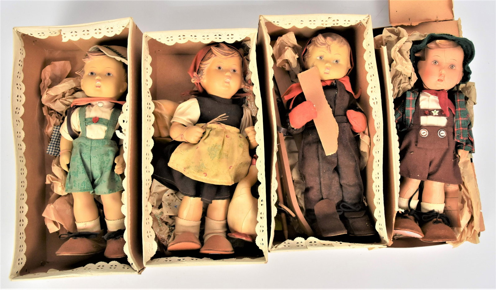 Four Rubber Hummel 11" Dolls: Lot of four Hummel 11" Dolls,some craquelure.