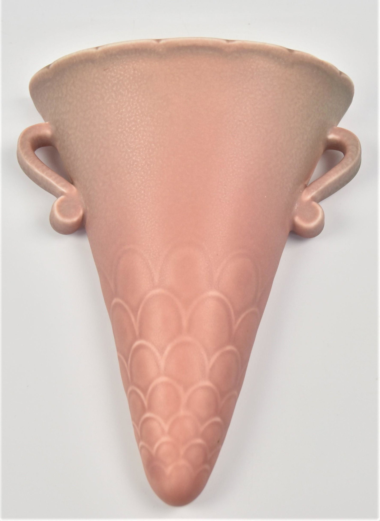 Rookwood Pottery Wall Pocket: Arts & Crafts in matt gaze with fish scale design, marked with Rookwood symbol, dated 1926, shape number 2958, designed by Kataro Shirayamadani, 5 1/2 x 2 1/2 x 7" high. Condition Fine.
