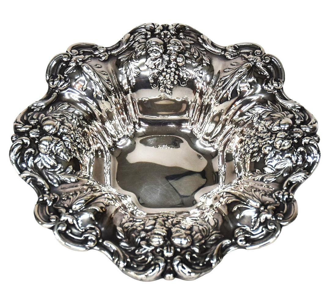 Francis I Reed & Barton Sterling Bowl: Chased floral and fruit on four feet, marked Reed & Barton Sterling X569F Francis I, 7 3/4" diameter x 2 1/4" high, total sterling weight 10.29ozt, or 320 grams. Condition Fine.