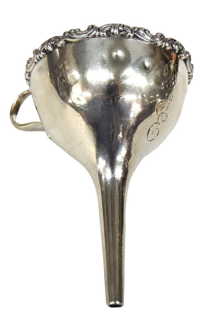 Duhme & Co. Sterling Wine Funnel: Cincinnati, Ohio jewelers and silversmiths, 1839-1887, floral scrolled lip, marked on body behind handle Duhme & Co. Sterling, engraved with initials FLE, 3 1/2 x 2 7/8 x 4 1/2" high, total Sterling w