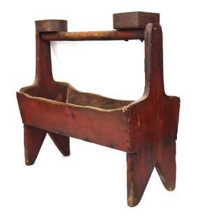 Red Painted Cobblers Carrier: Circa 1900-20 with cut-out boot jack ends wood dowel handle with two attached boot heel forms/nail holders, fine old patina with heavy use, 22 x 9 x 20 3/4" high. Condition as above, paint circa 80%.