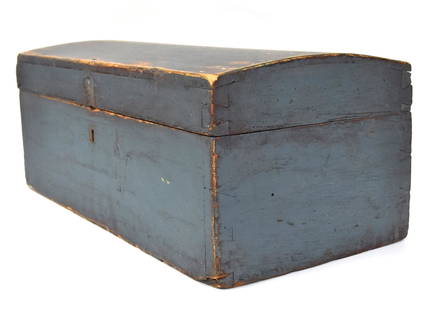 Blue Painted Trunk: White pine in dovetailed construction with lock, domed lid, old bur over original red painted finish, interior with blue paint on base and yellow on lid, nice old patina, 19 3/4 x 9 x 7 3/8" high.