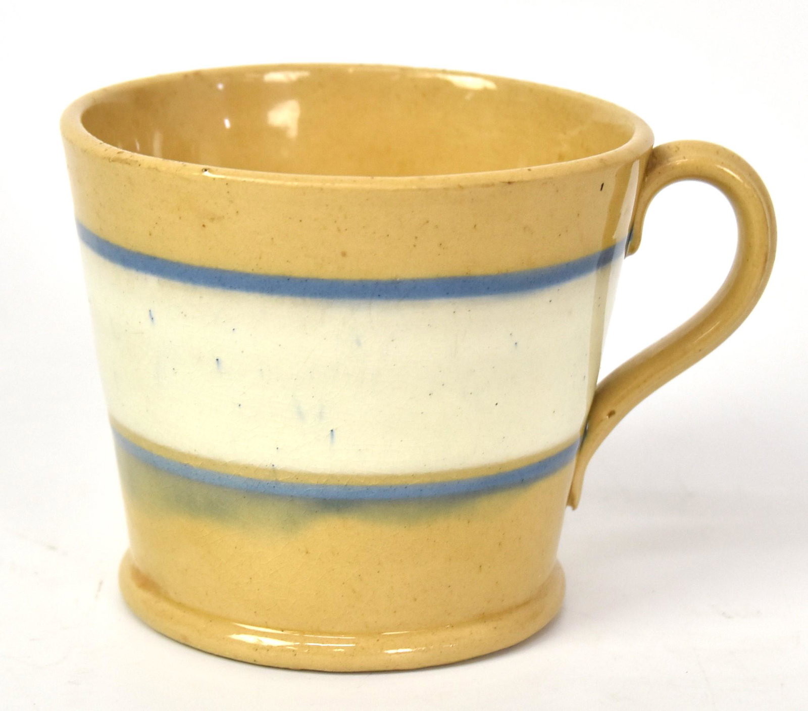 Early Yelloware Mug: With white and blue stripes. 4"H x 5"W. Good condition.