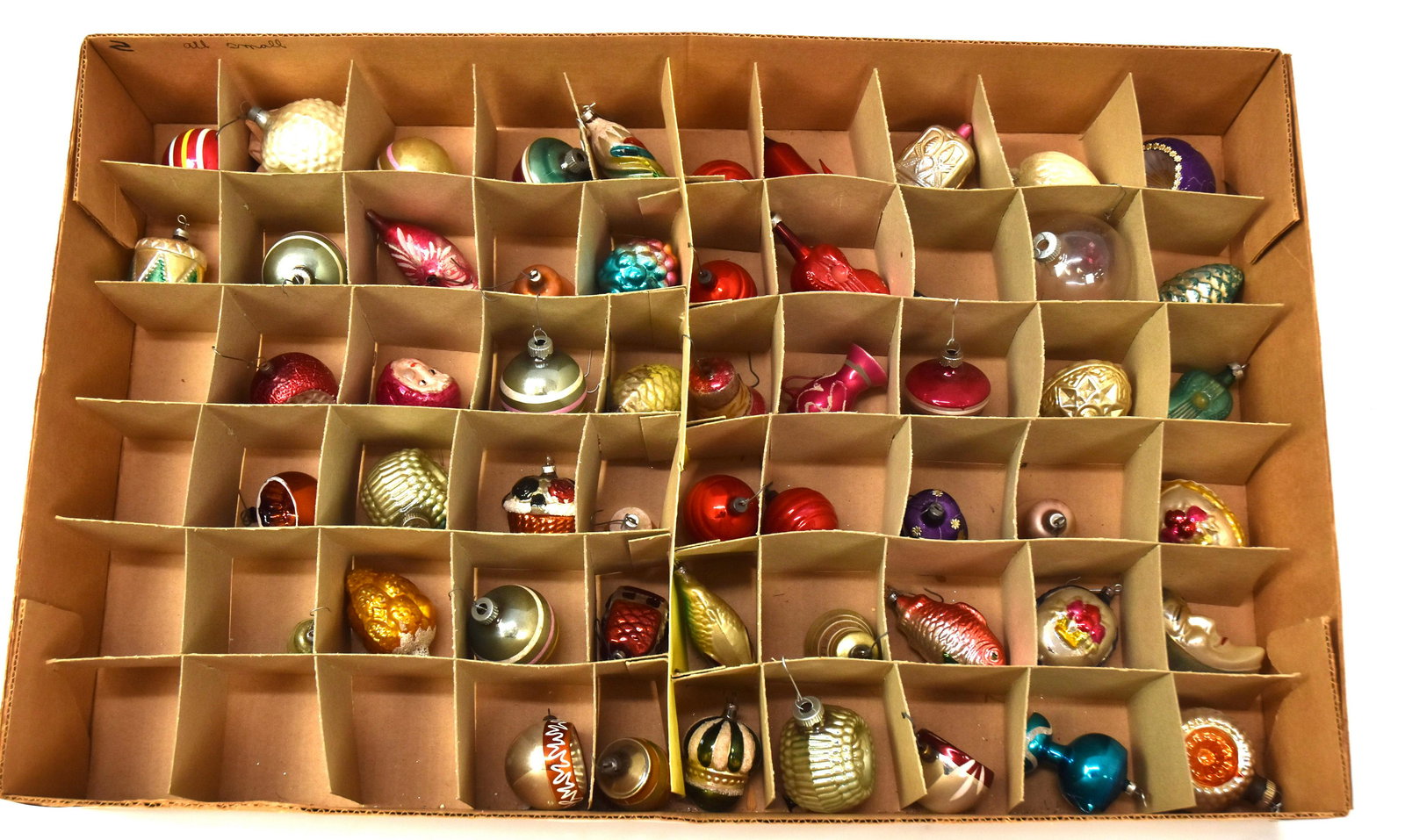 Lot of 54 Old Christmas Ornaments: Lot includes two fish, quarter moon face, peacock, coo-coo clock, face fiddle, teapot, house, pinecones etc. Good condition.