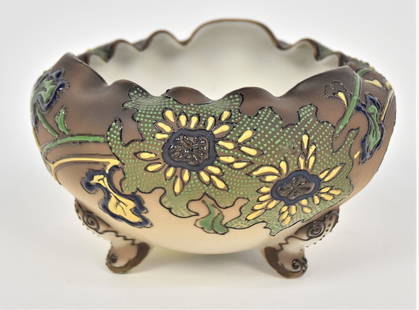 Arts & Crafts Style Tri-Footed Nippon Bowl: With beaded enamel exotic flowers 3 1/4”T. 5 1/4”W. Pleasing atypical design. Very good condition. Green mark.