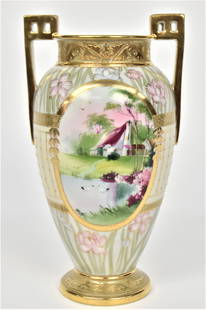 Lakeside Cottage & Scenic Nippon Urn With Pierced Handles: Raised gold designs. Abundance of gold application. Pastel florals. 11 7/8”T. 6”W. Colorful & pleasing. Very good condition. Green mark.