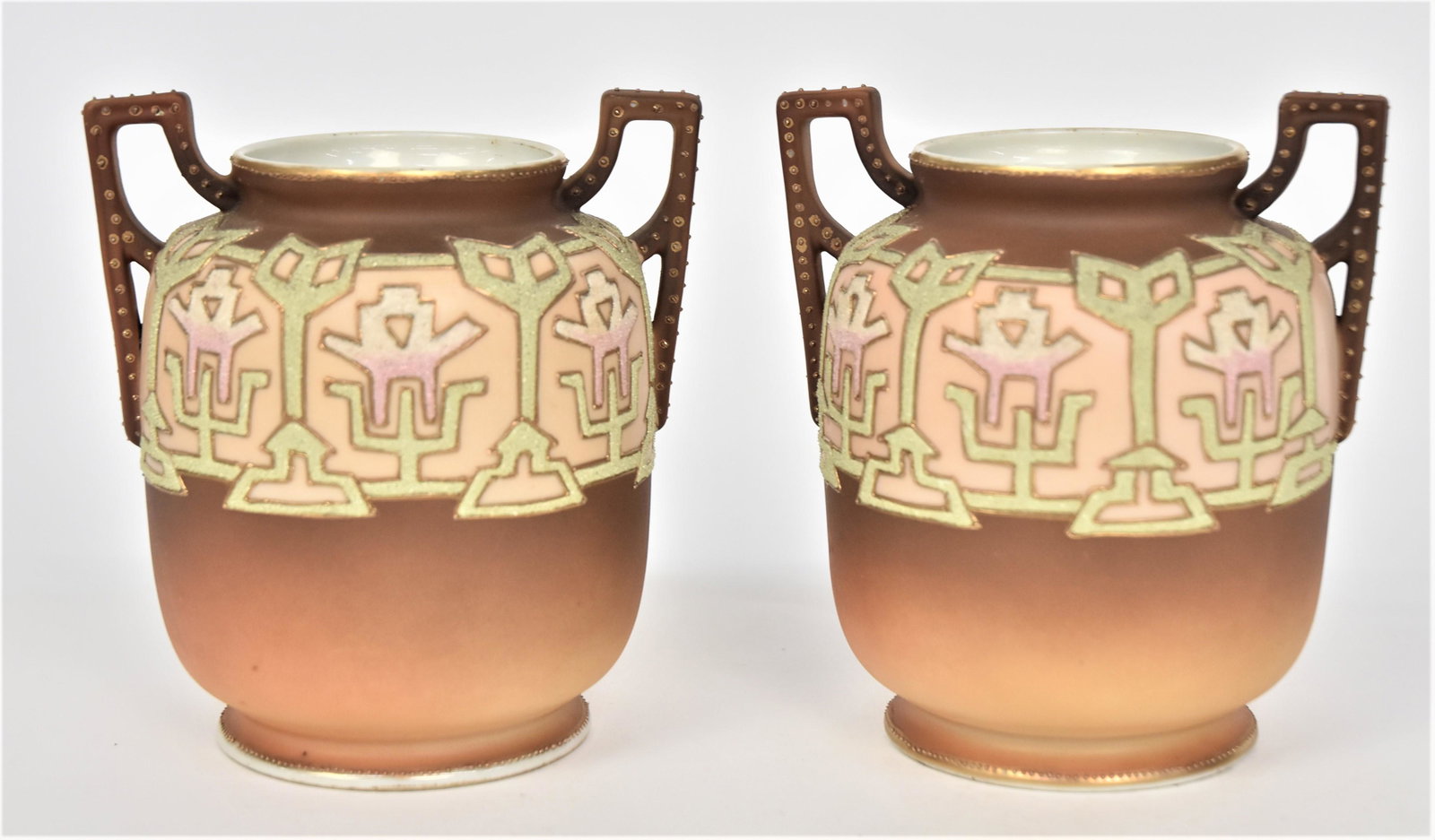 Pair Nippon Coralene Handed Vases: garnished With decorative patterns. 5 1/4” T. 4”W. Very good condition. Green & blue marks on each.