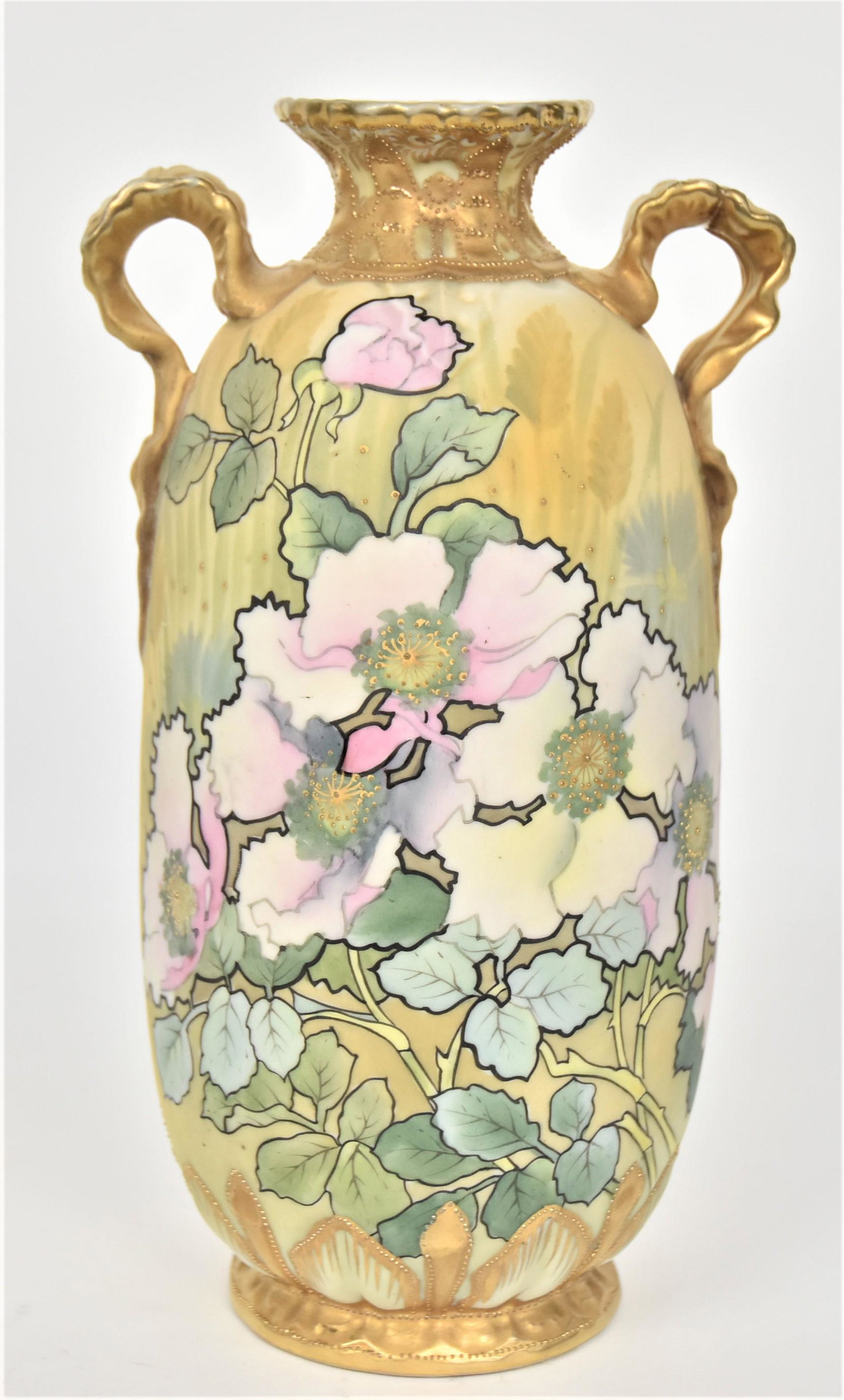 Nippon Poppy Vase: With gold ribbon-like handles & leaves & calla lilies in relief near the base. Pastel shadow floral backdrop. Raised gold enhancements. 9 3/4”T. 4 1/2”W. Decorative & in very good conditio
