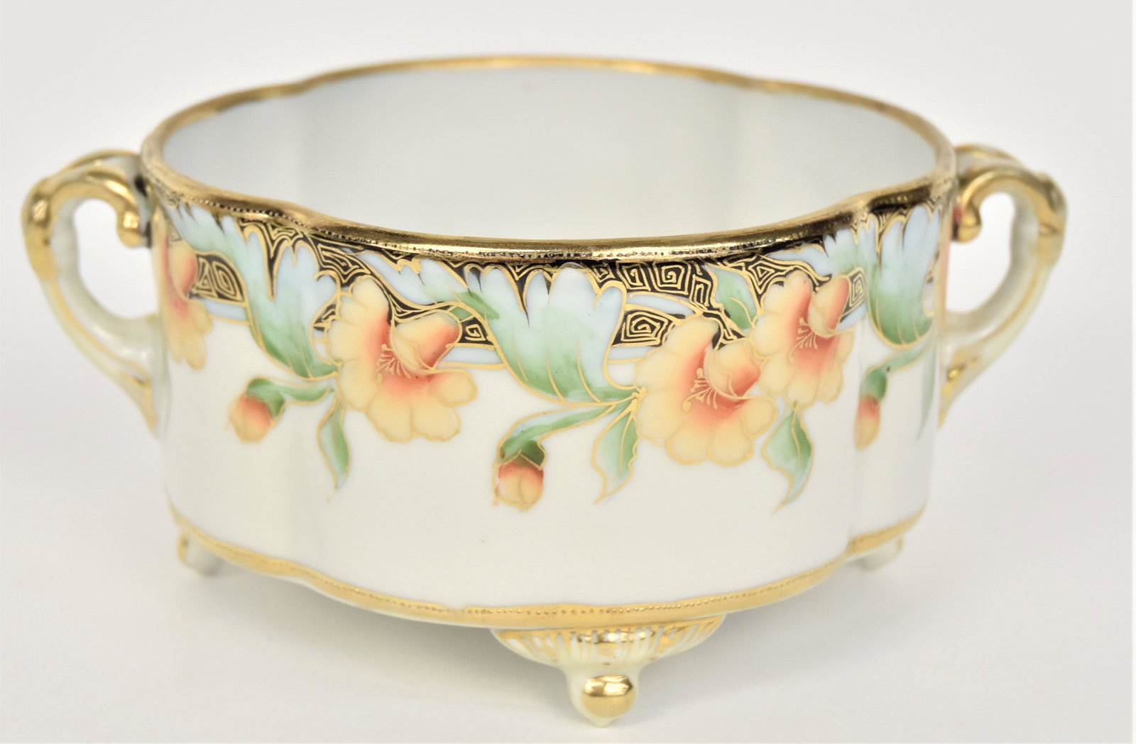 Nippon Footed Fernery: With freesia blossoms bordered by gold Greek Key design. Gold wishbone handles. 3 5/8”T. 8”W With handles. Gold wear. Good condition. Green mark.