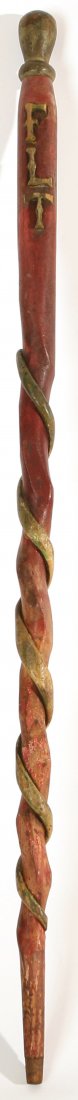 FOLK ART PAINTED & CARVED LODGE CANE: Great Folk Art cane with Odd Fellow symbols and FLT carved near top and carved wrapped around snake below. Nice original green and red paint. Some loss to symbols and tip of snake. 38" long.