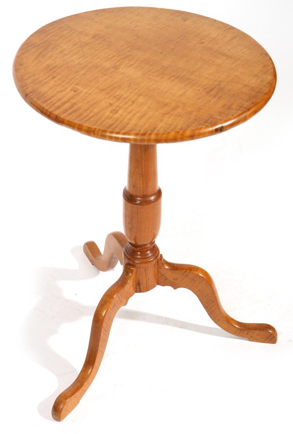 EARLY CURLY MAPLE CANDLE STAND: Curly maple top on walnut shaft resting on tiger maple snake feet. Refinished with repairs. 25 1/2" h. Top 18" diam.
