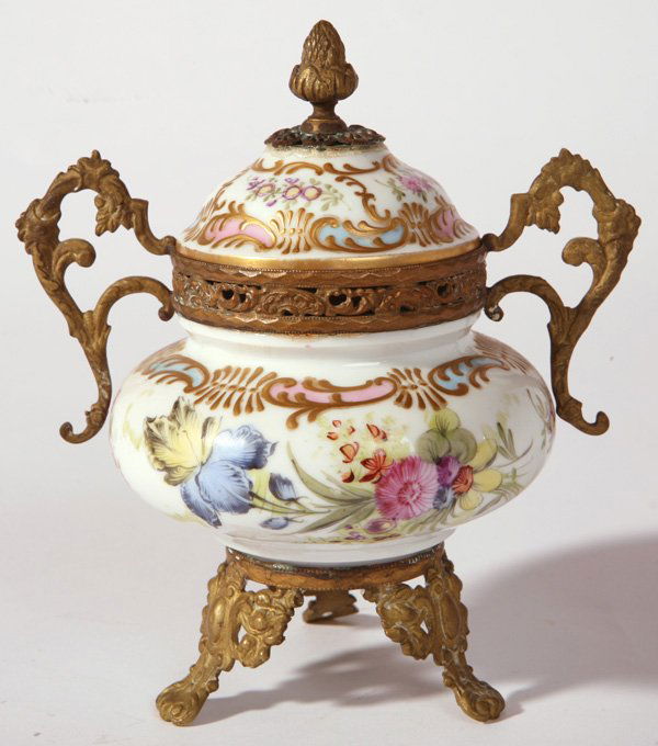 SAMPSON MEISSEN STYLE COVERED JAR: Hand decorated with florals and gold and ormolu mounts. Signed with cross swords and "S" mark. Fine condition. 6" h.