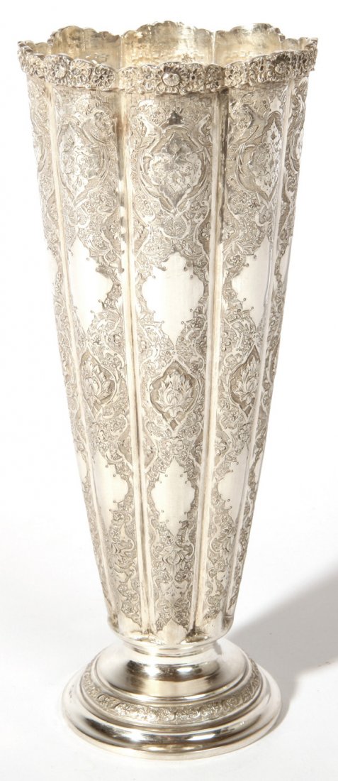 MIDDLE EASTERN SILVER VASE: With engraved stylized floral designs. Hallmarked on bottom. Good condition. 9 1/4" h. 12.15 Troy oz.