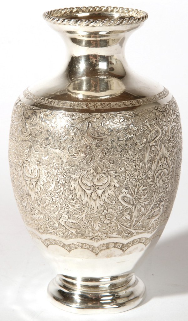 FINE MIDDLE EASTERN SILVER VASE: With all over engraved birds in flowering bushes. Roped lip. Arabic hallmarks. Fine condition. 6 1/2" high. 8.65 Troy oz.