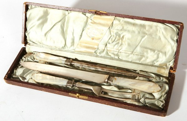 STERLING & M.O.P. CASED CARVING SET: 3-piece made by "Harris Bros & Howson Sheffield" in silk lined leather covered case. Minor wear to case. Knife is 12 3/4" long.