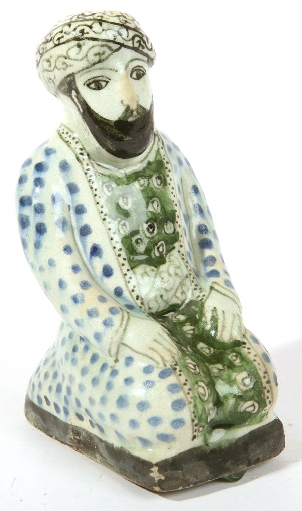 PORCELAIN FIGURE OF MIDDLE EASTERN MAN: Appears to have age. Fine condition. 9" h.