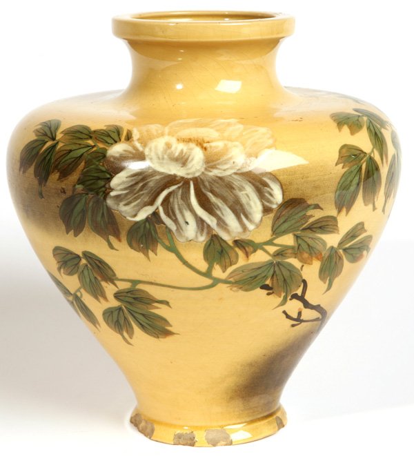 UNUSUAL JAPANESE YELLOWARE VASE: With painting of flowering tree branches. Two impressed marks on base. Numerous chips around base. 8 3/4" high.