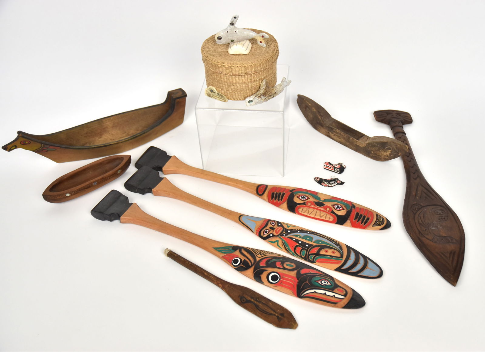 Northwest Coast Wood & Bone Carvings: Lot of 13, including three model wood boats, largest painted 14 1/2" long, middle likely 19th century with carving, 11" long and smallest with abalone inlay and carving, 7" long; plus five carved wood