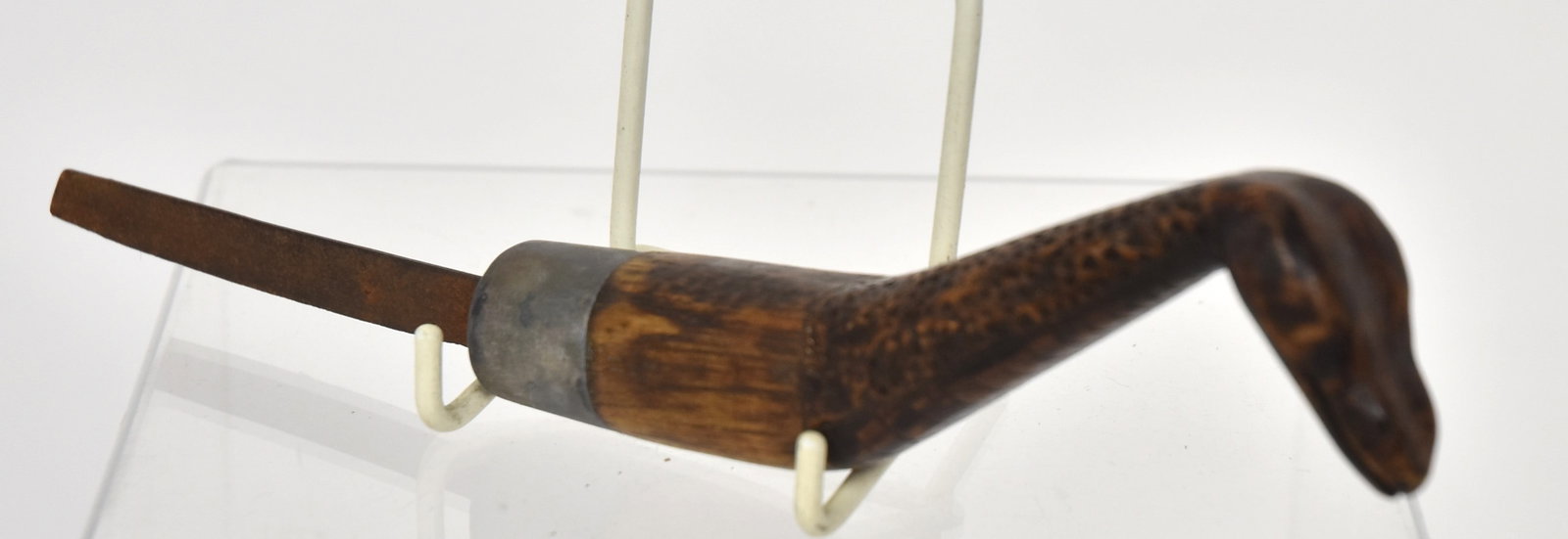 Eastern Woodlands Crooked Knife: Carved snake effigy hardwood handle with 1" lead collar and 3" steel blade, fine old patina, total length 8". Condition Fine.