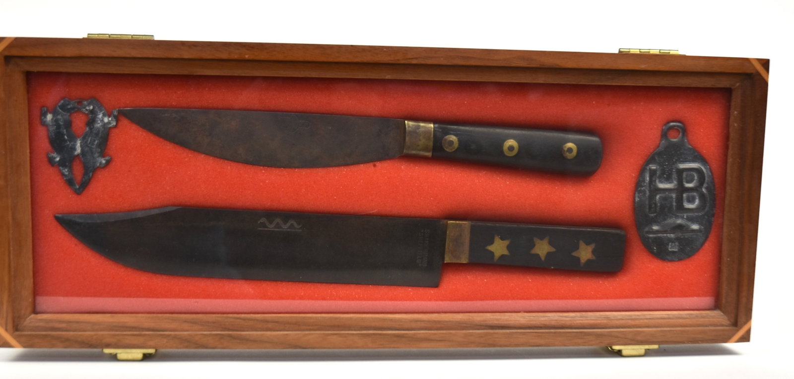 Hudson Bay Knives Plus: Lot of four, including bowie knife with clipped end marked on left ricasso Snake Brand Sheffield with engraved snake on top of left face of 9 1/8" long steel blade, brass collar with rosewood grips wi