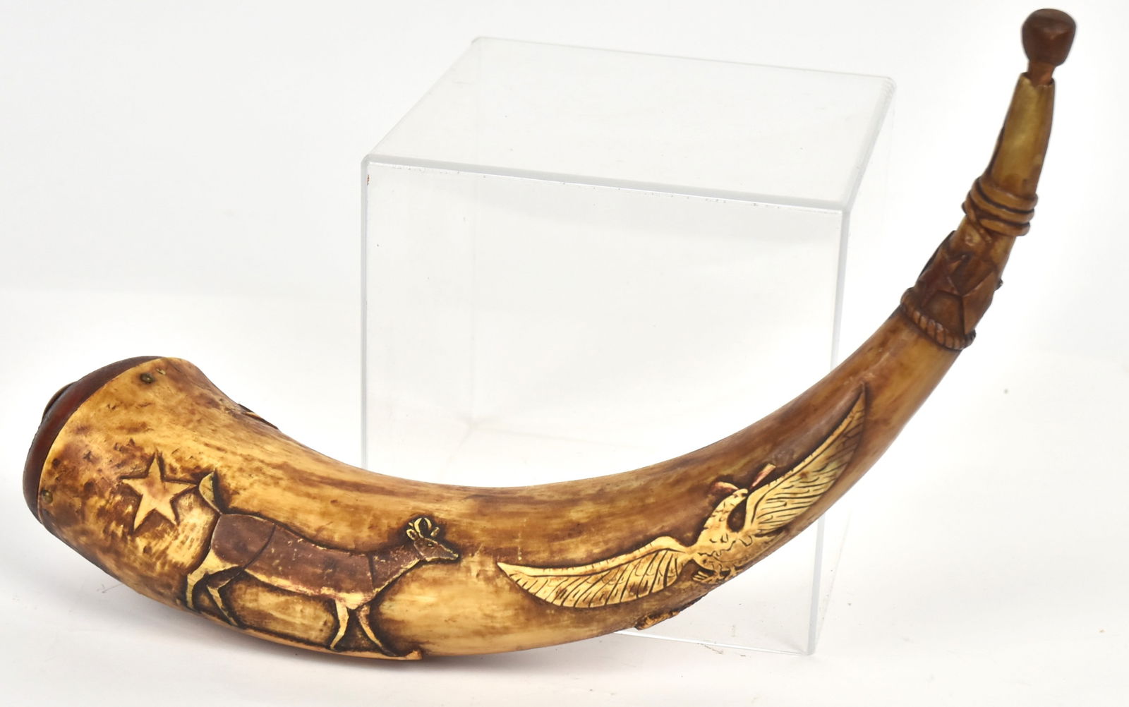 Folk Art Carved Powder Horn: Probably contemporary, with deer eagle stars saddle blanket with name J. Hall, carved spout with domed wood plug, 14 1/2" long. Condition Fine.