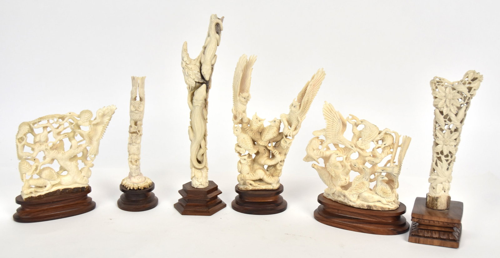 Beautiful Carved Antler Figural Group: Lot of six, including a sedge of cranes, a parliament of owls, a lek of birds of paradise, a convocation of eagles, a camp of chameleons & a pair of owls, all on rosewood bases, tallest is the chamele