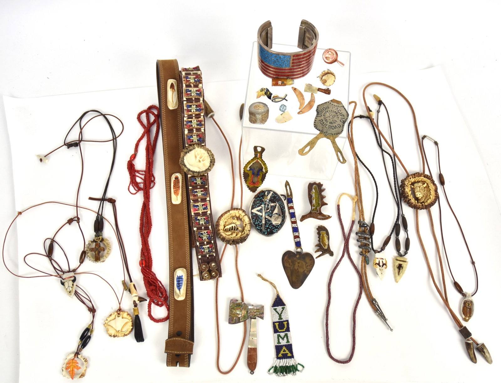 Misc. Belts & Jewelry: Lot of 30 including two antler decorated leather belts, many necklaces, pins, cuff bracelet and muc more. Condition from Good to Fine.