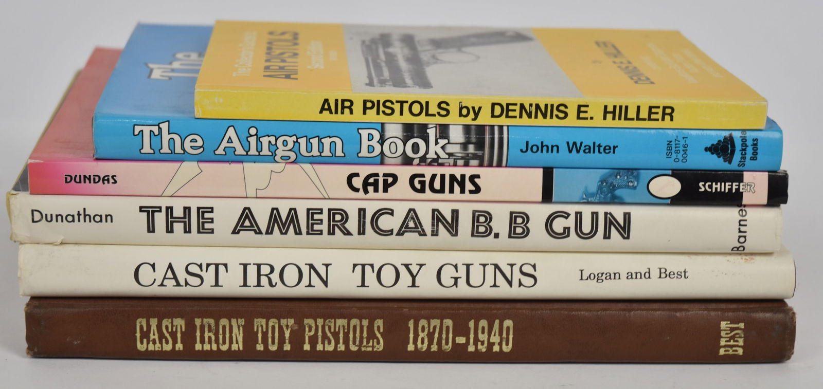 Books on Air & Cap Guns: Lot of six, including the following titles: Cast Iron Toy Pistols 1870-1940, by Charles W. Best, autographed on edition page No. 1503, 1973; plus Cast Iron Toy Guns and Capshooters, by S.H. Logan & C.