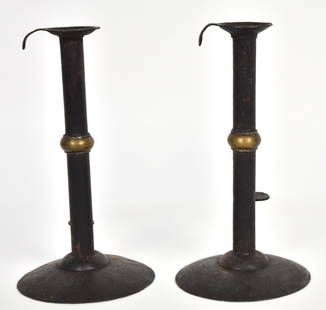 Large Early Wrought Iron & Brass Hog Scraper Candlesticks: Hand wrought iron with brass collars, thumb hook and domed base with pushups, nice old black patina, with hand cut square nut holding shaft to base, 5" diameter x 9 1/2" high. Condition Fine.