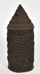 Revere Type Punched Tin Lantern: Cylindrical with cone top and hinged door with clasp, old brown patina, 4 1/2" diameter x 10 1/2" high. Condition lacks handle, else VG.