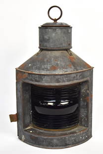 Early Tin Ships Lamp: Corner mounted with bluish green glass for starboard side of ship, hinged door in back and cast iron ring handle on top, electrified, formerly oil lamp, 8" on each side with rounded front x 18 1/2"