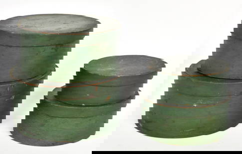 Painted Nested Pantry Boxes: Lidded nested set of four, in spruce & white pine all in original green painted finish, largest is 8 3/4" diameter x 4 1/4" high; smallest is 6"diameter x 2 1/4" high. All with fine old patina.