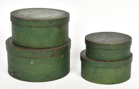 Painted Nested Pantry Boxes: Lidded nested set of four, in spruce & white pine all in original green painted finish, largest is 8 3/4" diameter x 4 1/4" high; smallest is 6"diameter x 2 1/4" high. All with fine old patina. Condit