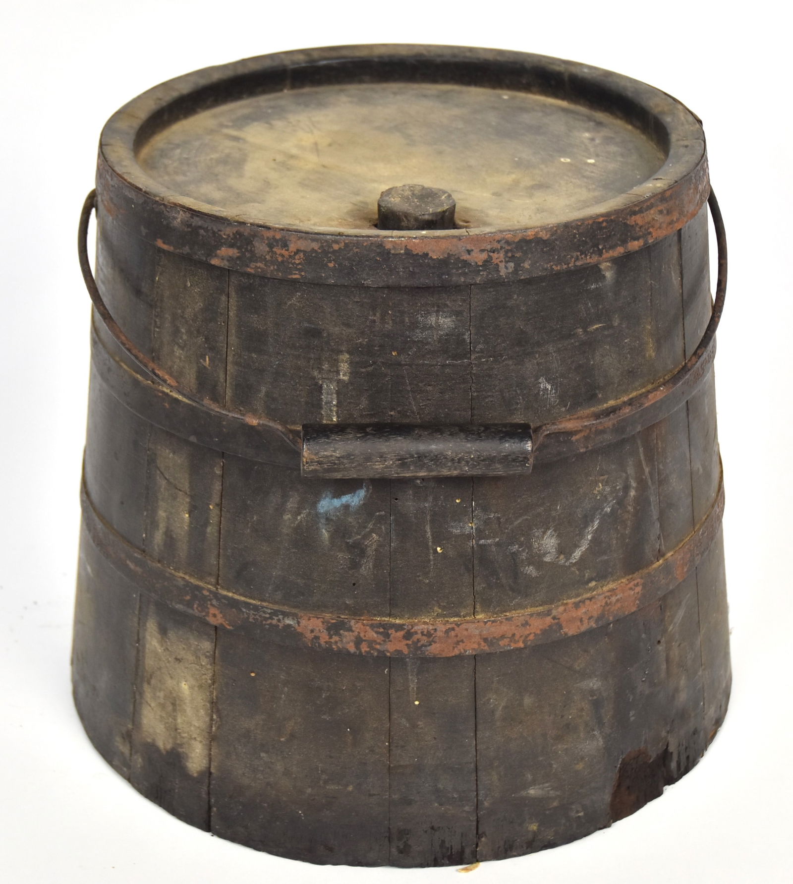 Shaker Painted Bucket: Stave construction with three wrought iron bands, lidded with wood plug stopper, original heavy gauge wire bale handle with turned wood grip, all in old likely original charcoal grey painted finish, 1
