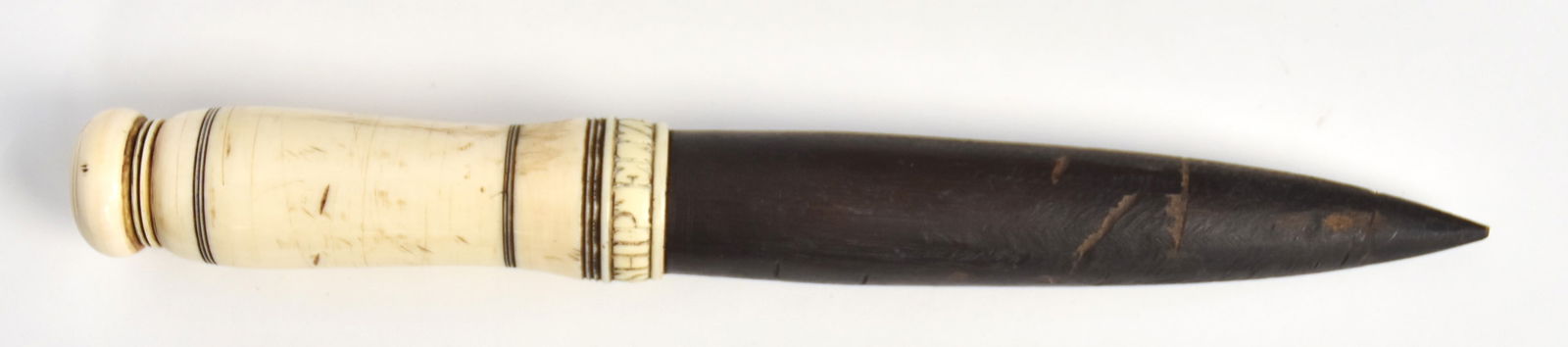Scrimshaw Fid from Ship Eliza, Salem Mass.: Turned whales tooth grip with engraved Ship Eliza Salem and traces of red pigment, with ebony point, nice old patina, 10 1.4" long. Condition Fine.