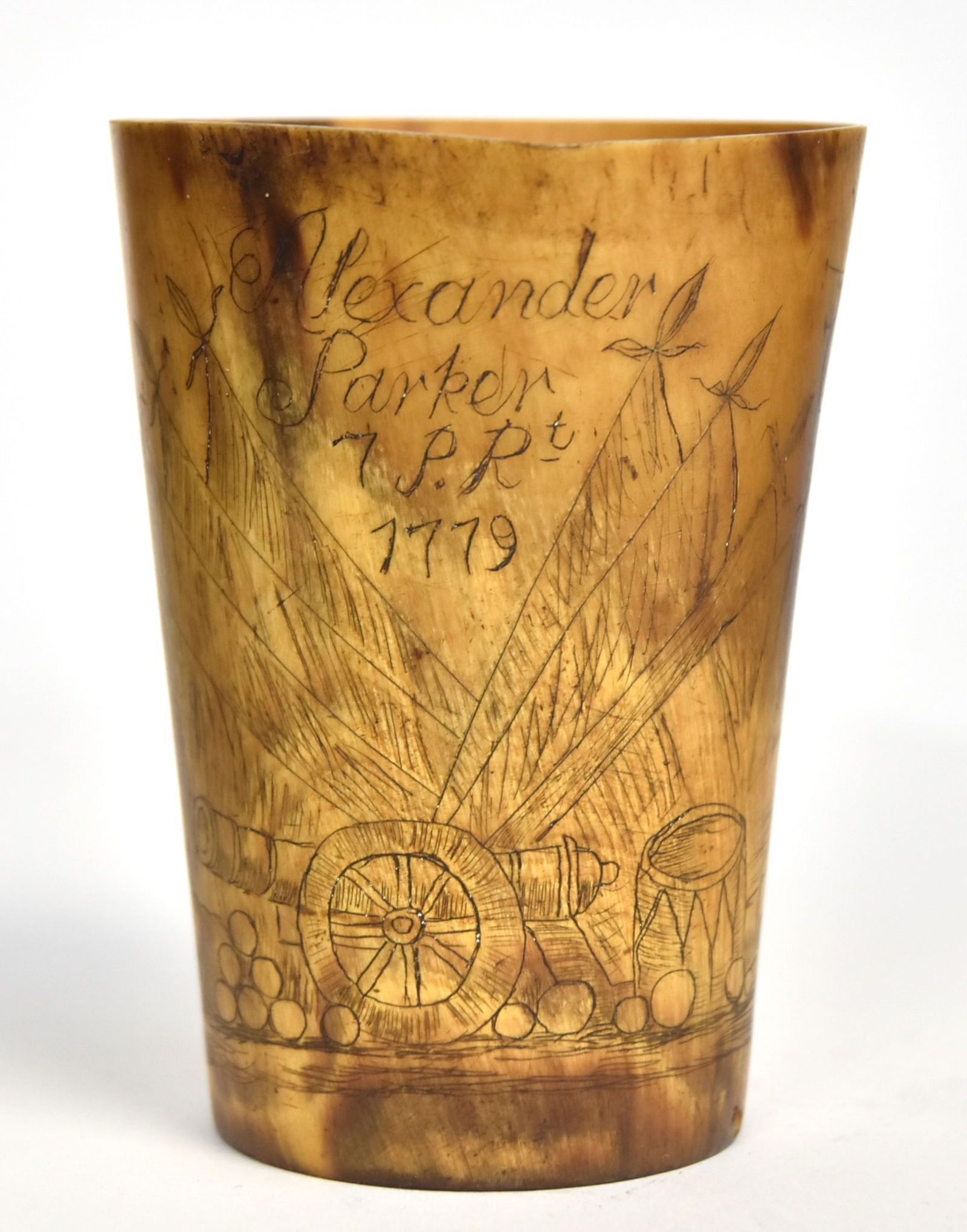 Revolutionary Scrimshaw Horn Cup: Engraved with field artillery, drum and cannon balls with eight crossed flags behind, one at far right looks like Union Jack with inscription above: Alexander/Parker/7 P.Rt./1779; reverse with vase wi