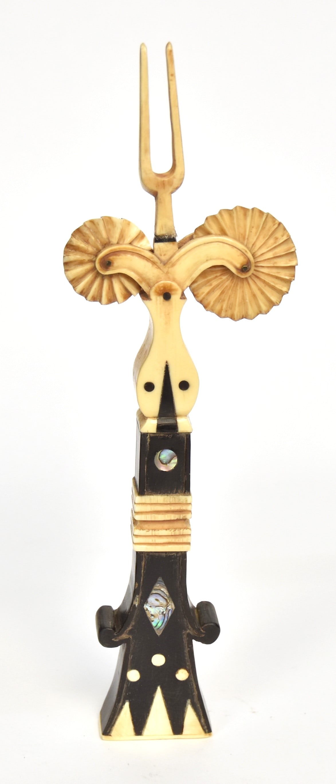 Scrimshaw Jagging Wheel: Pie Crimper in walrus, abalone, baleen and dark horn with two fluting wheels, testing fork with carved walrus and horn grip inlaid with abalone, walrus and baleen, nice patina, 9" long. Condition Fine