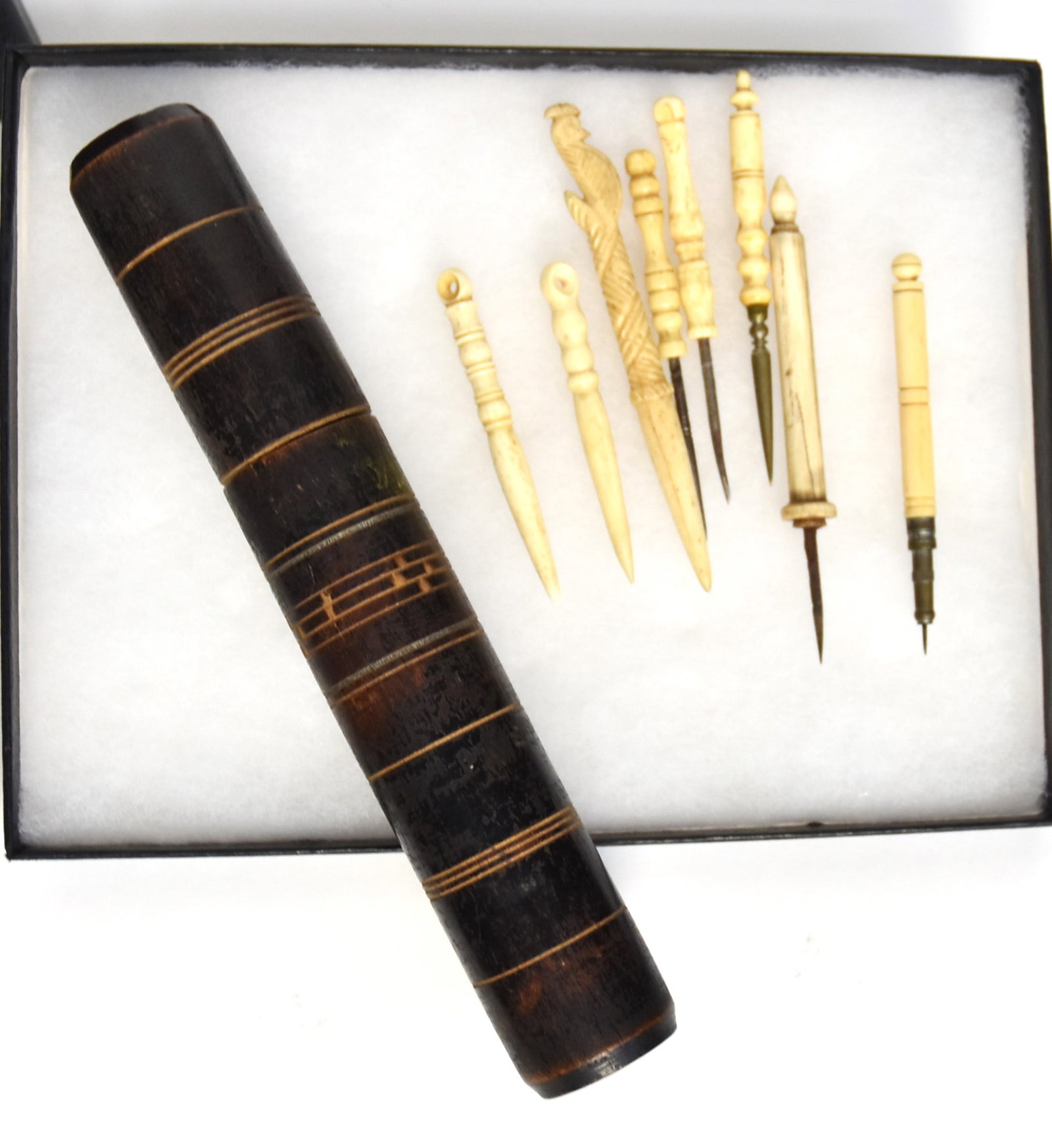 Group of Scrimshaw Engraving Tools & Bodkins Plus: Lot of nine, including five engravers tools with turned whale tooth or bone handles and steel tips, 3 1/4 to 3 78" long; plus three bodkins (sewing tools) two turned one/tooth and one with carved figu