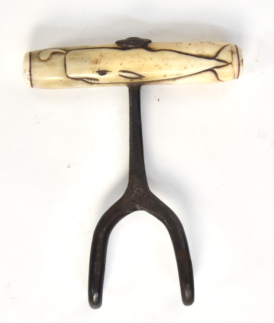 Scrimshaw Wool Bale Hook: Whale tooth, whale bone, baleen, red lead and wrought iron with grip being carved whale tooth with relief full length Sperm whale on one side and initials EH flanking heart on the other, end caps in w