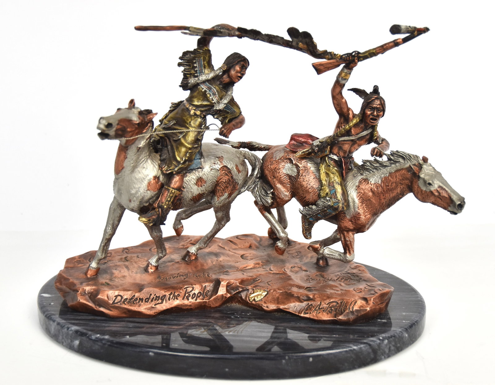 Christopher Pardell Native American Bronze: Entitled Defending the People Moving Robe; Crazy Horse, cold painted bronze of two mounted Plains Native Americans, female & male of the above names, with gilt arrowhead on base, signed twice, once on