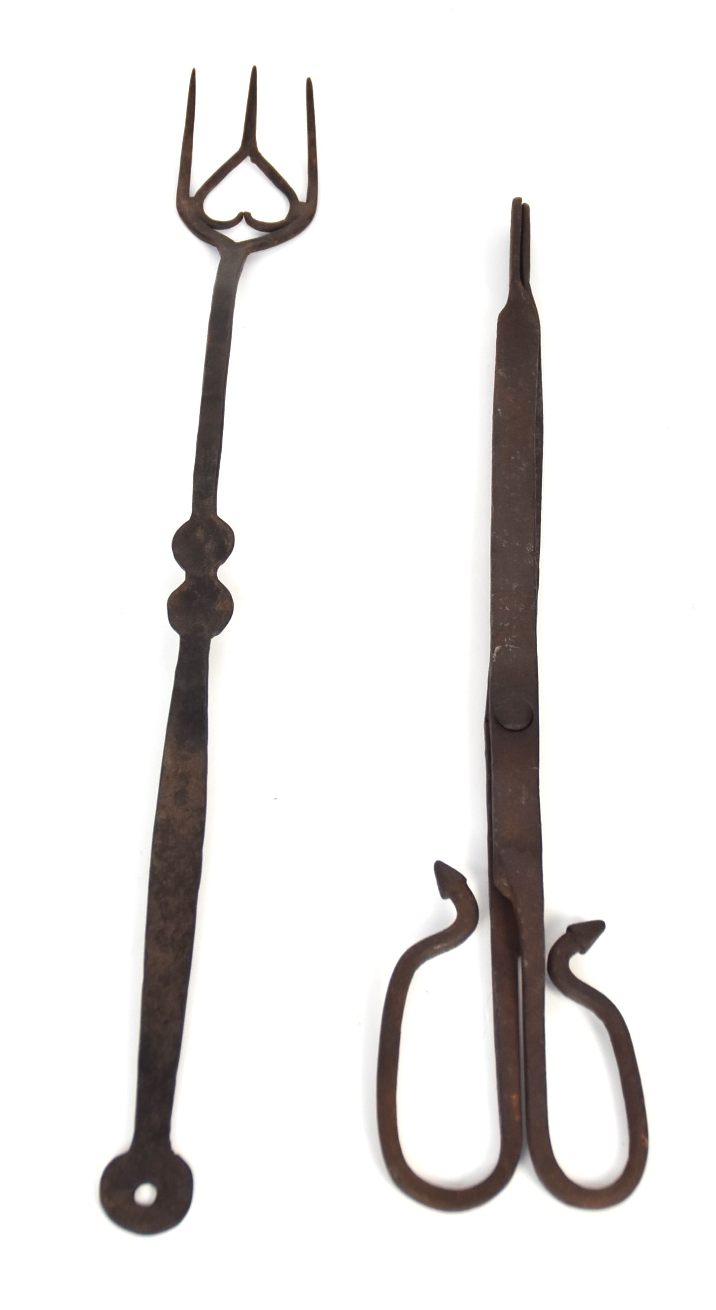 Wrought Iron Toasting Fork & Pipe Tongs: Lot of two including a nice wrought iron toasting fork with heart motif, 19" long with nice black patina; and wrought iron pipe tongs with acorn terminals on handles, nice brown to black patina, 16 1/