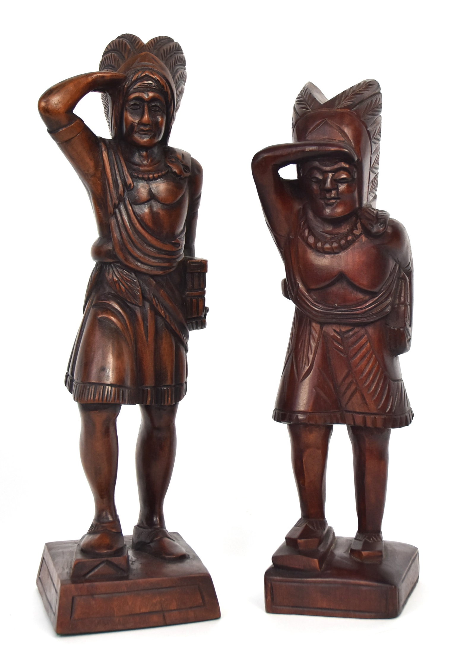 Two Counter-top Cigar Store Indians: Both in mahogany with nice old patina, 13 1/2 & 12" high. Condition Both VG+.