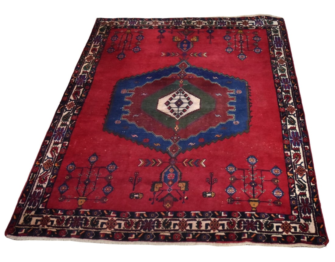 Fine Persian Area Rug: All hand made with deep red ground and stylized floral patterns, three borders, nice deep pile, 60 x 81". Condition VG+.